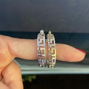 Slightly worn hoop earrings